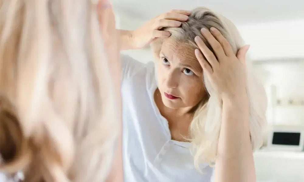 femme avec chute de cheveux après la grossesse